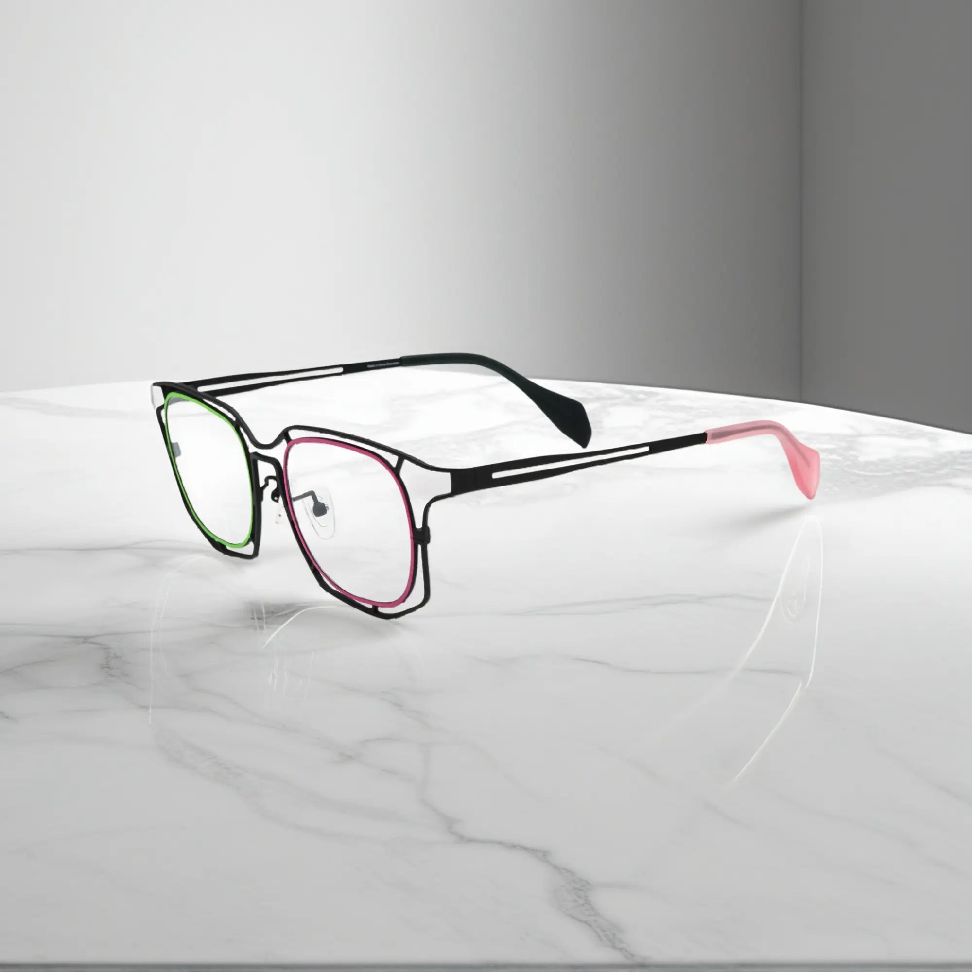 Side view showing pink and green elements of Mint Pink Fusion titanium frame